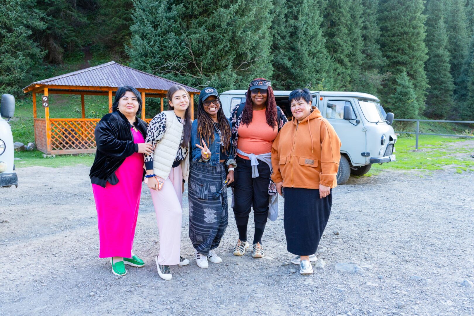 Group picture with local Kazakh women at Kaindy Lake. Lauren Gay and Nadine Duncan