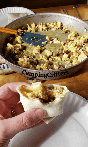 scrambled eggs, sausage in a burrito