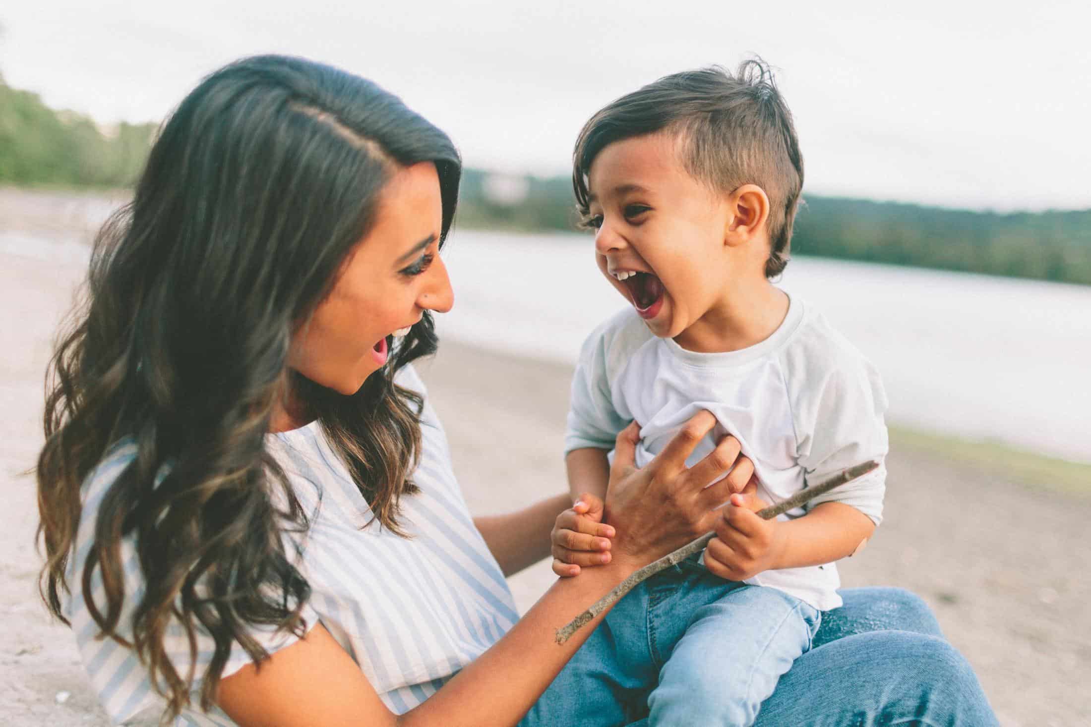 beach-smiling-mother-toddler