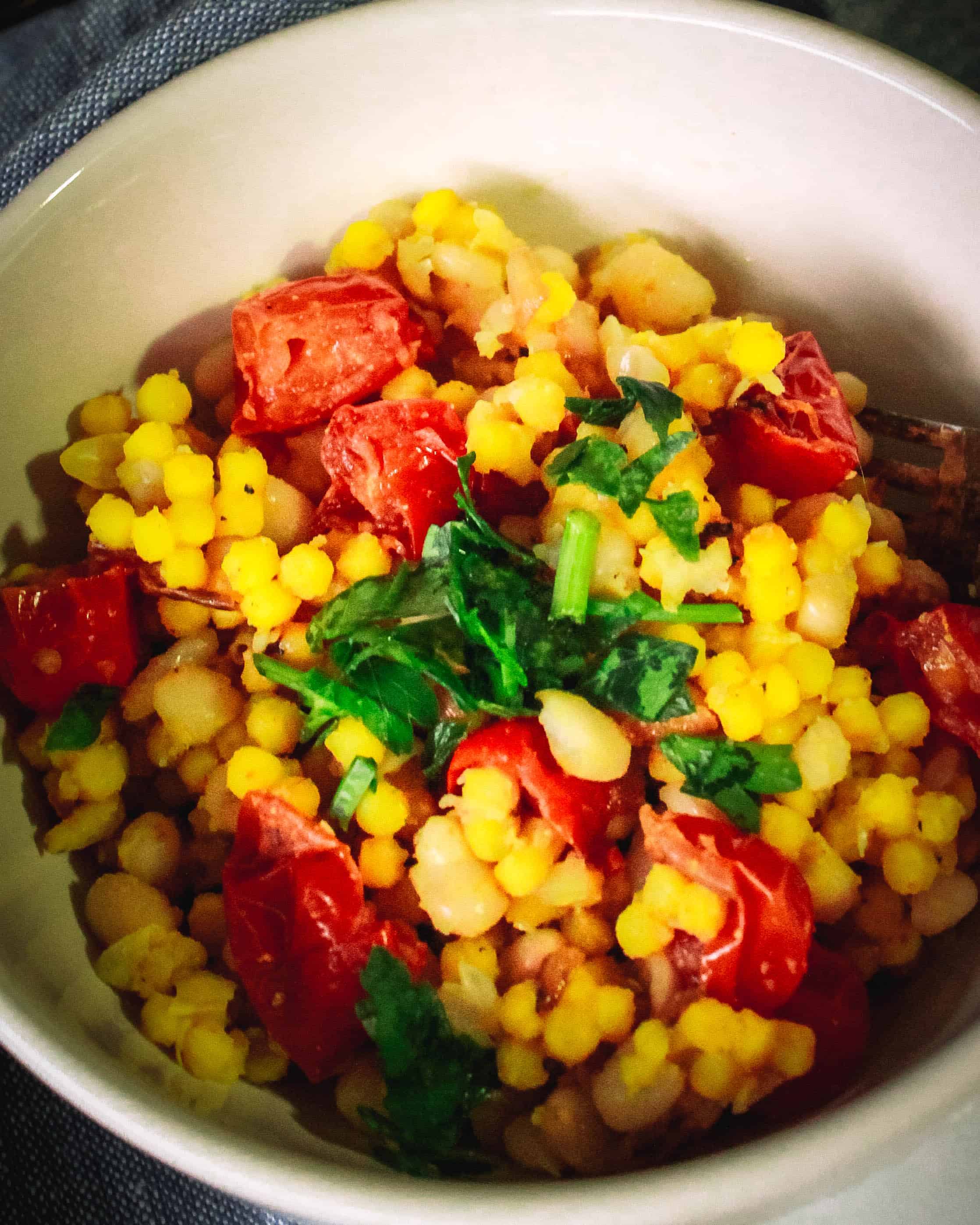 Turmeric Couscous with Navy Beans and Cherry Tomatoes