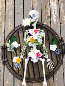 skeleton decorated with flowers