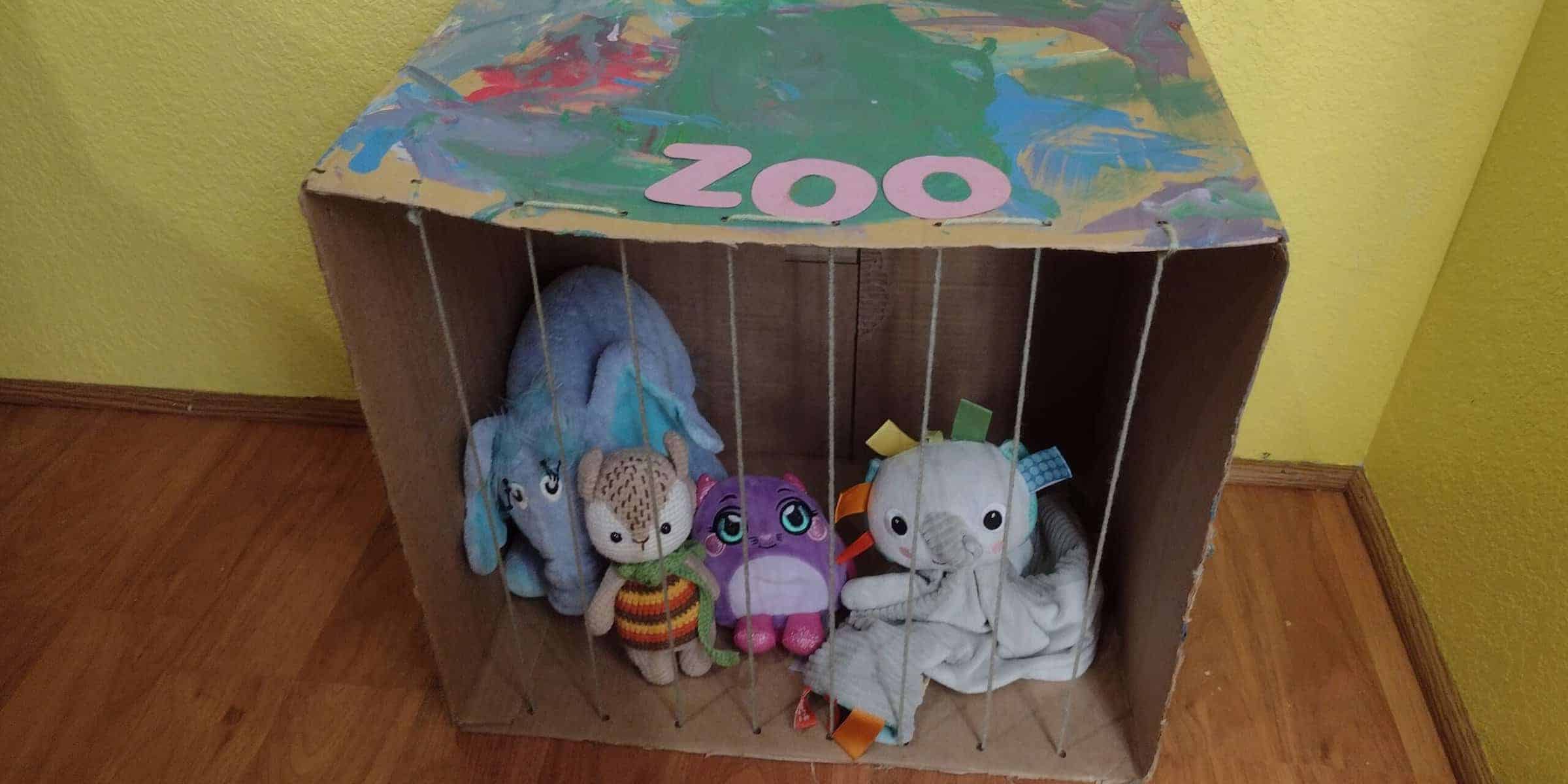 A Pretend Zoo Made From a Cardboard Box