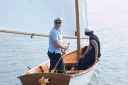 Joost and Viola sailing their Goat Island Skiff in the Netherlands