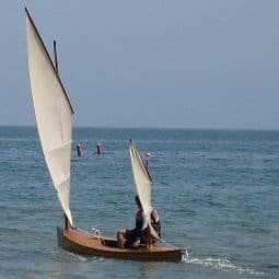 Classic Beth Sailing canoe with lug canoe rig in Florida - lighter and cheaper than a sailing dinghy - plywood boat plan