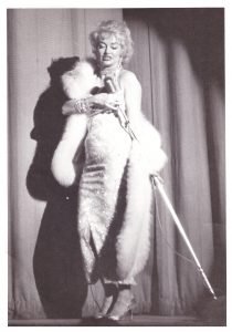 Burlesque dancer Dixie Evans performs