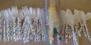 Picture of polka dot painted plastic utensils and cups