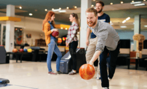 Group of friends who are newly sober bowling together