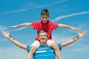 father and his son plays outdoors