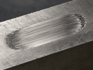 US Corrosion - wear scar from B611 abrasion testing on a carbide material.