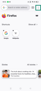 Firefox on Android homepage with three-dot menu icon highlighted