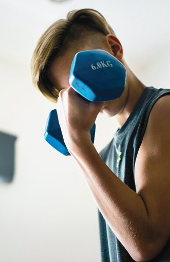 Teen boy working out