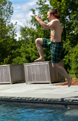 Jumping in pool at Woodbury