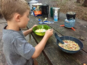 Camping dinner from backpacking pouches