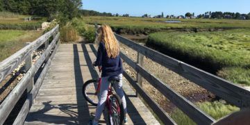Biking toward the ocean near kennebunk beach, maine