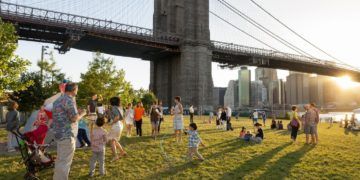 A nice lawn with skyline views at empire fulton ferry park