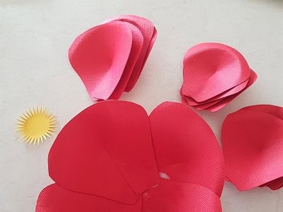 Paper flower petals organised ready to glue together