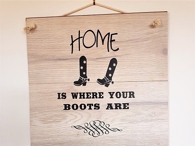 Home is where your boots are vinyl sign 