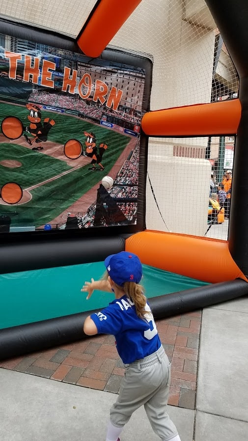 My daughter testing out her throwing skills at Orioles Park at Camden Yards