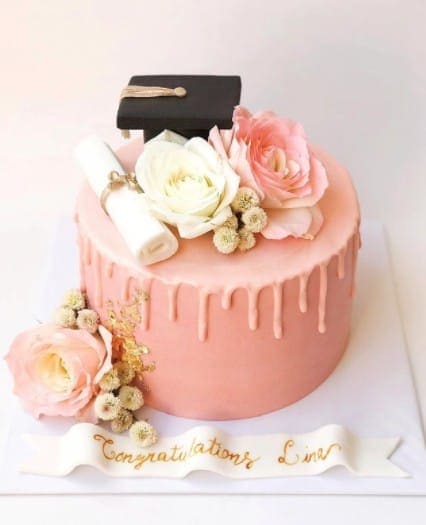 Elegant Pink Cake with Cap and Flowers