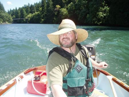 Outboard power. Goat Island Skiff is easy to build sails with one to four adults and is quick and beautiful: storerboatplans.com