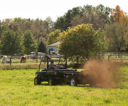 ATV/UTV Small Manure Spreader In A Pasture