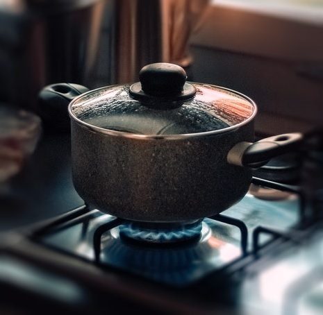 stainless-steel-cookware-on-stove