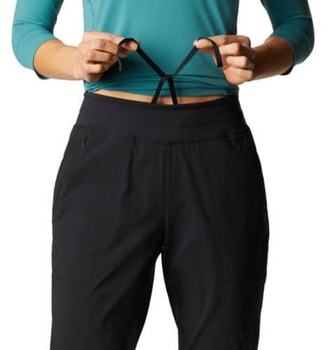 Mountain hardwear hiking pants are stretchy, wide through the hip and have a drawstring waist.