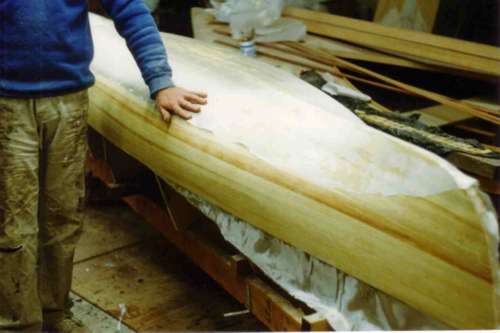 Very light glass is the best way to save weight on strip planked canoes and kayaks: storerboatplans.com