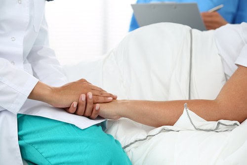 a doctor is holding a patient