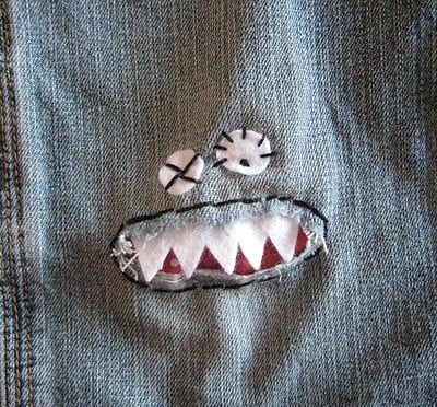 Turn holes in jeans into monsters with this fun sewing tutorial. A great idea for a Halloween costume too. Monster knee patch.