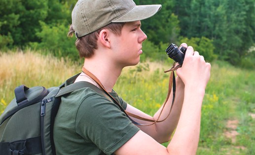 Teen boy hikes