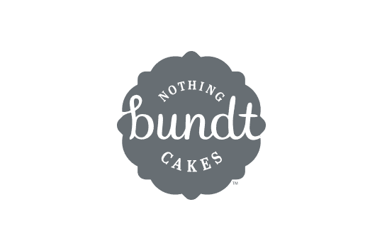 Nothing Bundt Cakes logo featuring white text in a playful script and serif font, centered on a scalloped dark gray badge background.