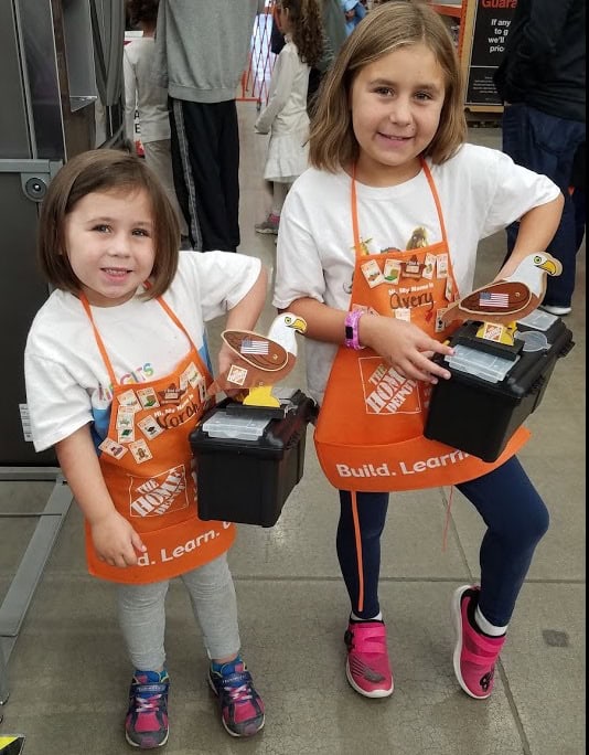 Image of the MacAloney girls with their toolboxes.