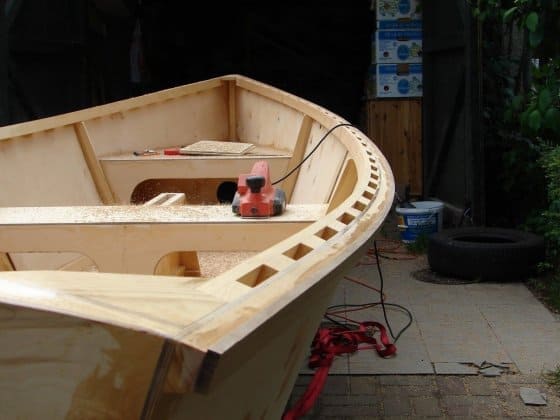 Home building a Goat Island Skiff in the back yard. Robert Hoffman Poland. storerboatplans.com