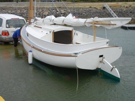 Fenwick Williams Catboat built in cedar strip at DuckFlat Wooden Boats Australia. detail design work by storerboatplans.com