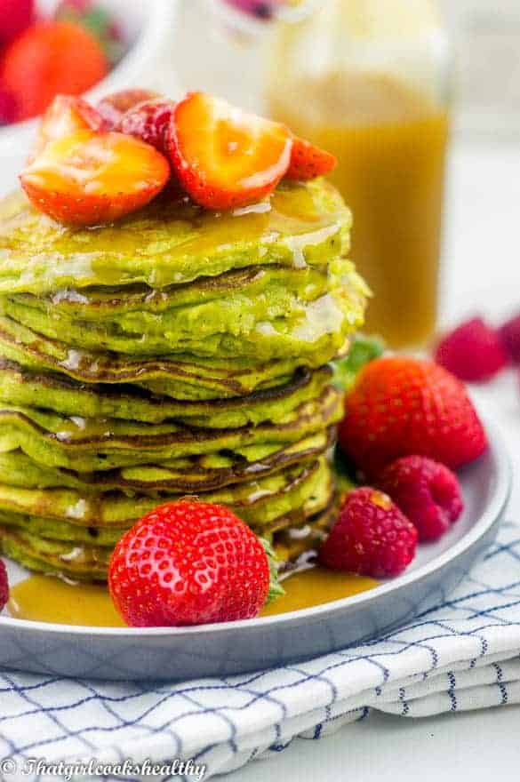 https://sp-ao.shortpixel.ai/client/to_auto,q_lossy,ret_img,w_585,h_880/https://thatgirlcookshealthy.com/wp-content/uploads/2018/02/Green-smoothie-pancake.jpg