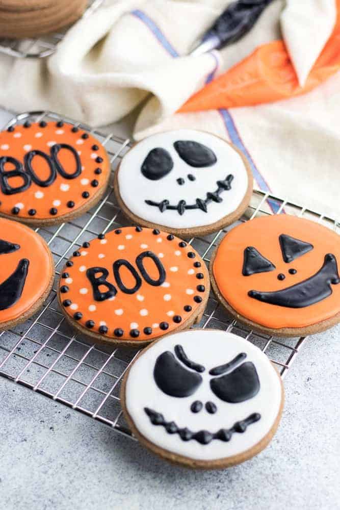 Halloween Cookies are classic soft cut out chocolate sugar cookies made with cocoa powder and decorated with easy sugar icing!