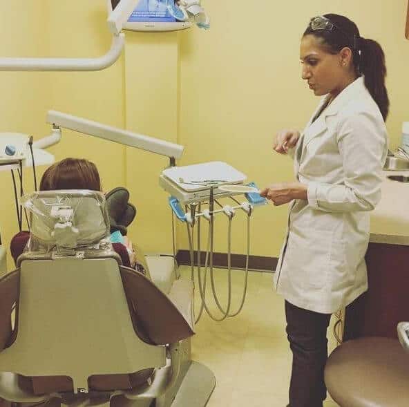 Sachar Dental Hygienist with patient Teeth Cleanings in NYC Manhattan