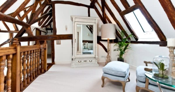 turn awkward, dead spaces into stunning and artistic nook in a tudor style house interior