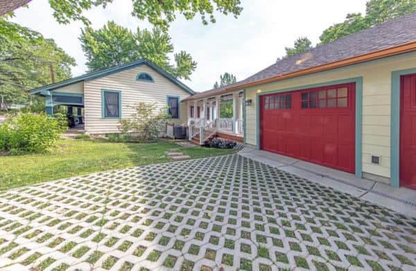 play with bold colors to create an eclectic craftsman house, complete with a detached garage and breezeway