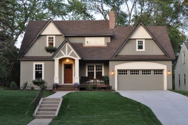 concrete front steps that lead to a charming and traditional cottage house design can be a genius idea