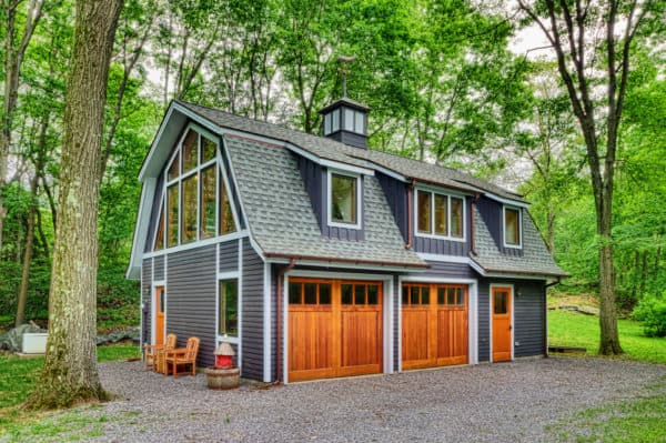 wooden barn doors for your garage to create a cozy cabin-in-the-wood feel