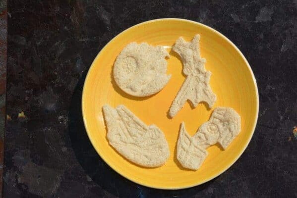 Star Wars Day Celebration -- Using the Plunger style cutters to make ships of bread.