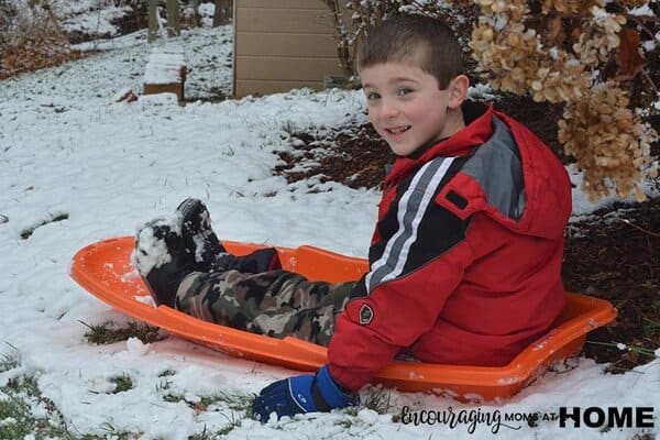 Joshua Waits his turn on the sled