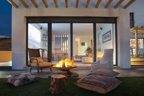 Fire pit at night. Ericeira Ocean View Villa is the best place to stay in Ericeira