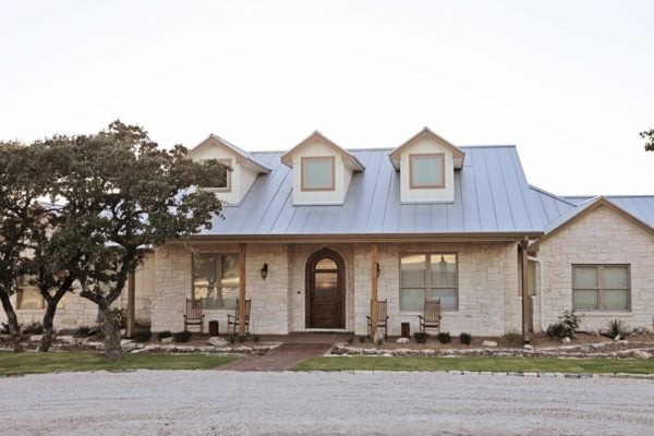 arched alder wood front door to create quintessential country ranch vibes