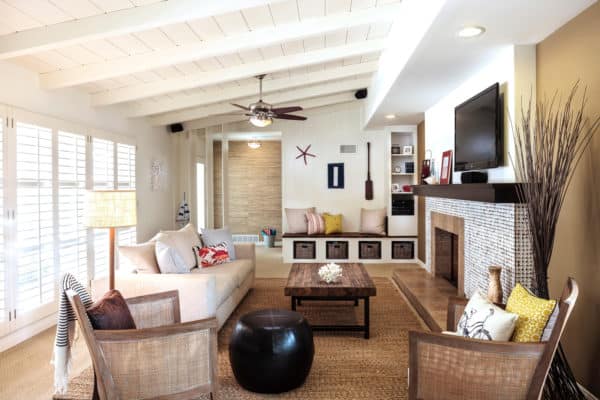 brown tiles in front of classic fireplace for a rustic chic vibe mixed with modern elements