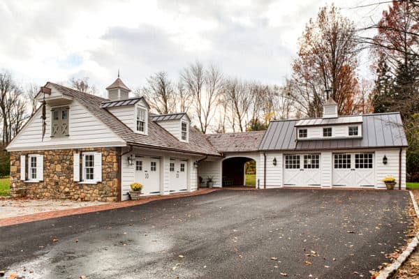 try a classic farmhouse style with this stunning detached garage idea and private breezeway