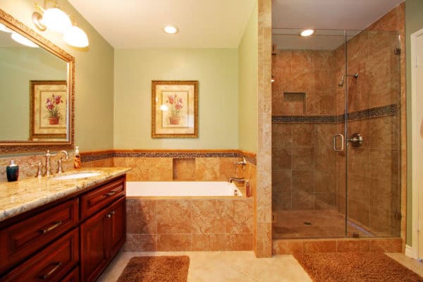 pair alcove shower with brown ceramic tiles and green walls to induce traditional charm