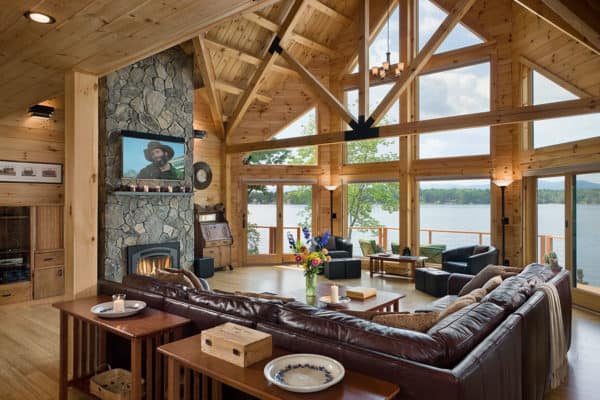 try a scenery-centred log cabin living room using light toned wood flooring and walls